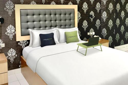 Imagen de la habitación del Hotel Urbanview Niraz Syariah Banjarmasin. Foto 9