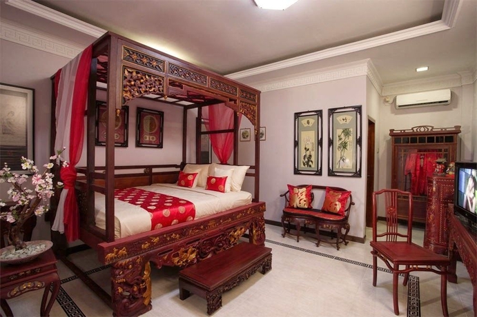 Imagen de la habitación del Hotel Urbanview Omah Eka Santi by RedDoorz. Foto 5