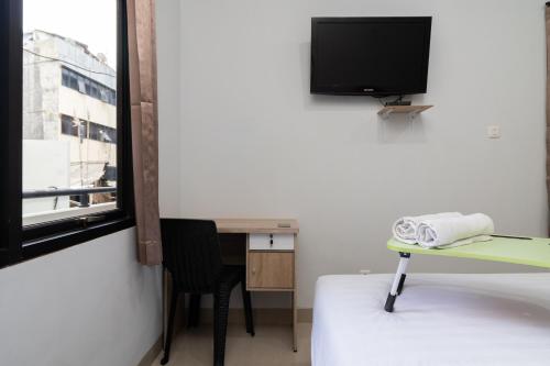 Imagen general del Hotel Urbanview Pasar Baru Jakarta. Foto 13