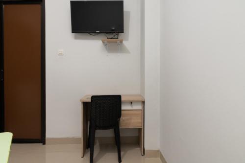 Imagen de la habitación del Hotel Urbanview Pasar Baru Jakarta. Foto 20