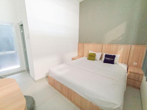 Imagen de la habitación del Hotel Urbanview Subali Purwokerto. Foto 19