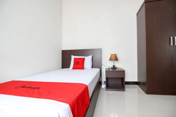 Imagen de la habitación del Hotel Urbanview Syariah Casa Azmya Yogyakarta. Foto 10
