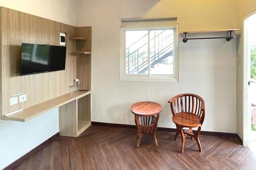 Imagen de la habitación del Hotel Urbanview The Tang Balikpapan. Foto 11
