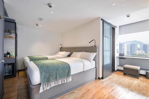 Imagen de la habitación del Hotel Urbanwood Ap Lei Chau. Foto 17