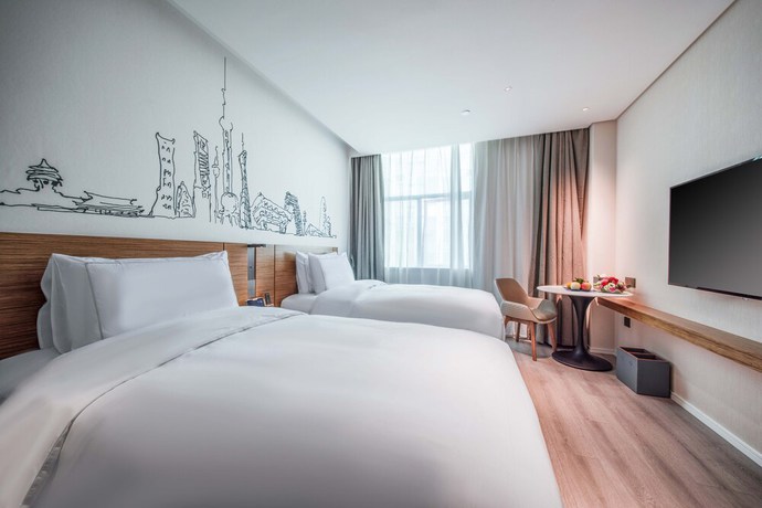 Imagen de la habitación del Hotel Urcove By Hyatt Shanghai Wujiaochang. Foto 8