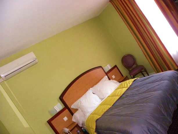 Imagen de la habitación del Hotel Ursula. Foto 19