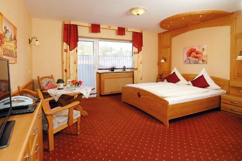 Imagen de la habitación del Hotel Ursula Garni. Foto 9