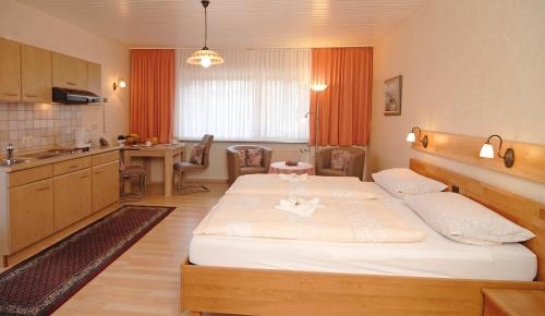 Imagen de la habitación del Hotel Ursula Garni. Foto 10