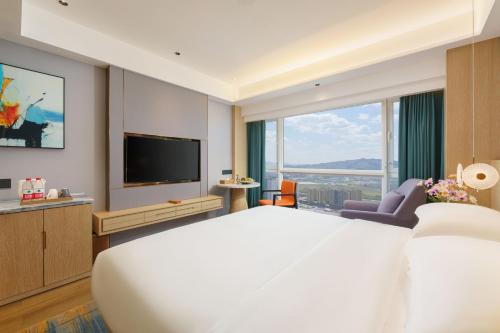 Imagen de la habitación del Hotel Urumqi Luolan. Foto 20