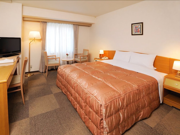 Imagen de la habitación del Hotel Urvest Hotel Ohmori. Foto 8
