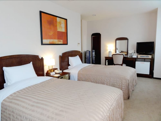 Imagen de la habitación del Hotel Urvest Hotel Ohmori. Foto 10