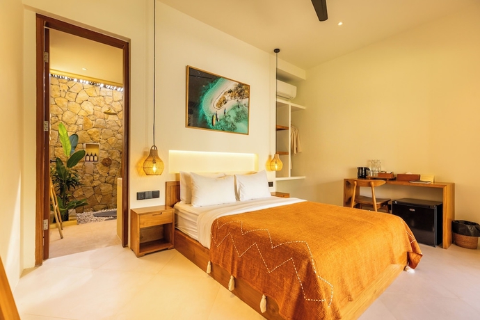 Imagen de la habitación del Hotel Uryah Lombok. Foto 3