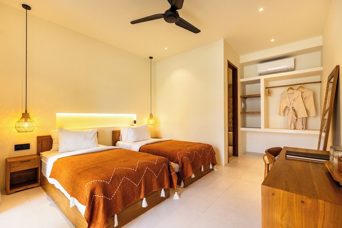 Imagen de la habitación del Hotel Uryah Lombok. Foto 5
