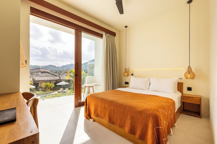 Imagen de la habitación del Hotel Uryah Lombok. Foto 6