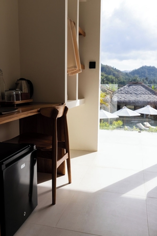 Imagen de la habitación del Hotel Uryah Lombok. Foto 7