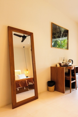 Imagen de la habitación del Hotel Uryah Lombok. Foto 8