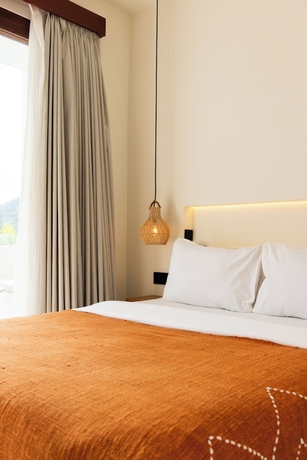 Imagen de la habitación del Hotel Uryah Lombok. Foto 12