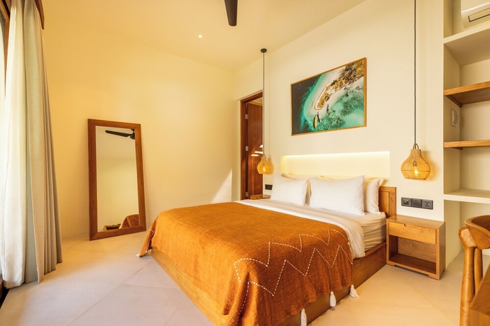 Imagen de la habitación del Hotel Uryah Lombok. Foto 13