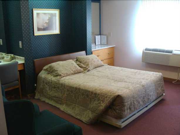 Imagen de la habitación del Hotel Usa Inns Of America. Foto 13
