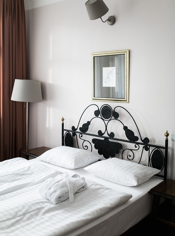 Imagen de la habitación del Hotel Usadba. Foto 15