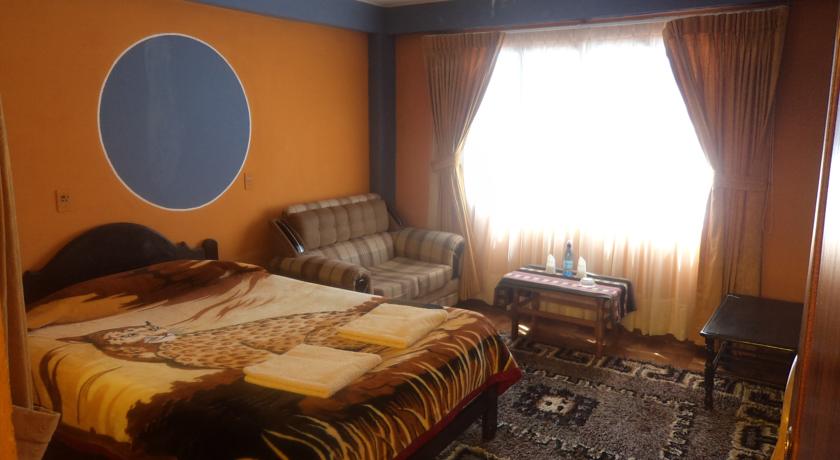 Imagen de la habitación del Hotel Utama. Foto 6