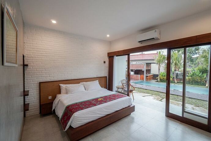 Imagen de la habitación del Hotel Utamas Keramas. Foto 27