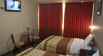 Imagen de la habitación del Hotel Utasa Inn. Foto 8