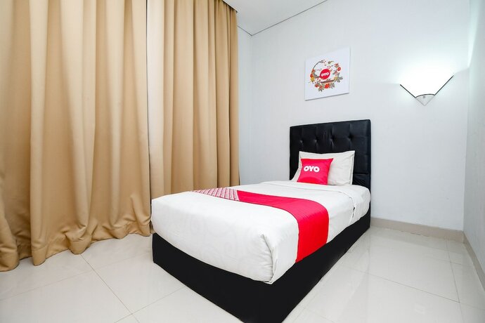 Imagen de la habitación del Hotel Utc Semarang. Foto 7