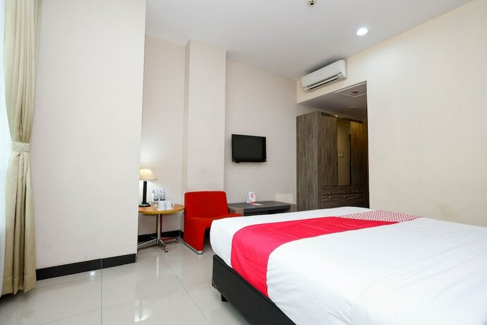 Imagen de la habitación del Hotel Utc Semarang. Foto 17