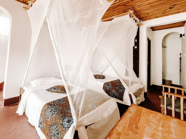 Imagen de la habitación del Hotel Utengule Coffee Lodge. Foto 18