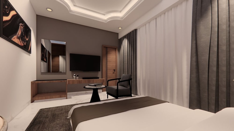Imagen de la habitación del Hotel Utkals Bhubaneswar. Foto 5