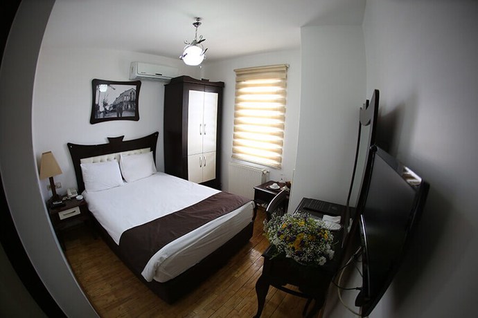Imagen de la habitación del Hotel Utkubey. Foto 5