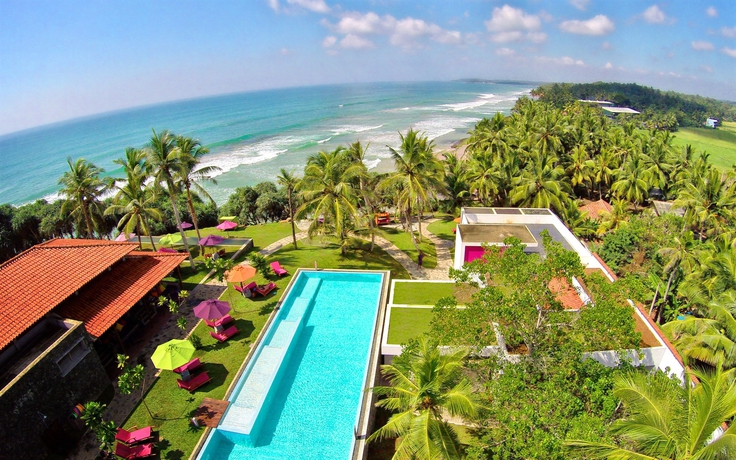 Imagen general del Hotel Utmt Underneath The Mango Tree Beach and Spa. Foto 1