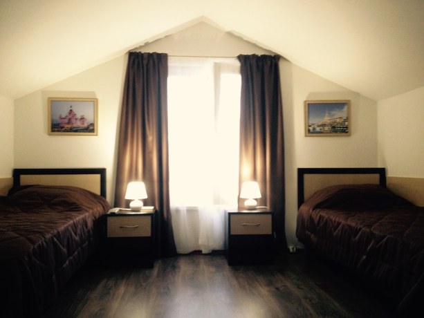 Imagen de la habitación del Hotel Utomlennye Solntsem. Foto 10