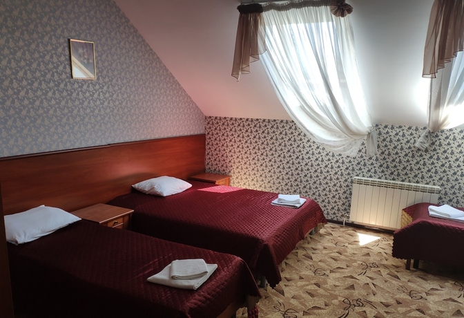 Imagen de la habitación del Hotel Utomlyonnye Solntsem. Foto 5