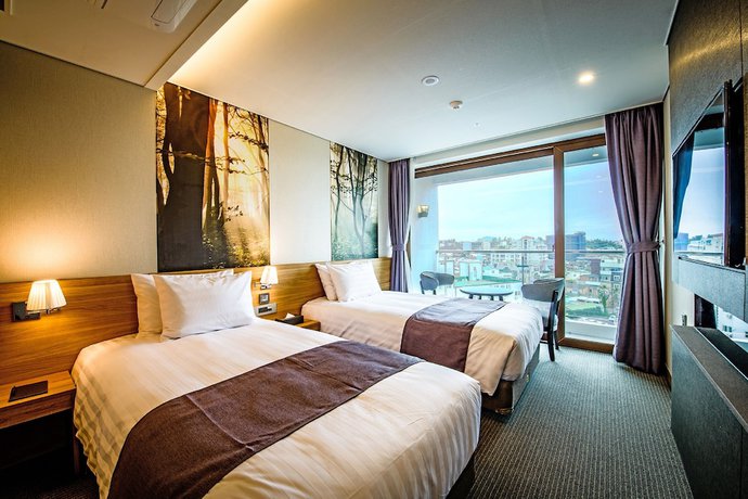 Imagen de la habitación del Hotel Utop Ubless Jeju Hamdeok. Foto 9