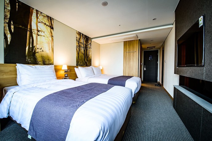 Imagen de la habitación del Hotel Utop Ubless Jeju Hamdeok. Foto 15