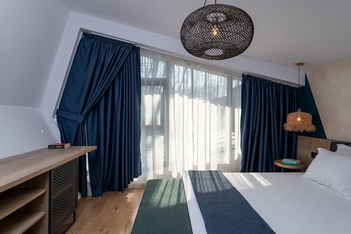 Imagen de la habitación del Hotel Utopia Forest. Foto 13