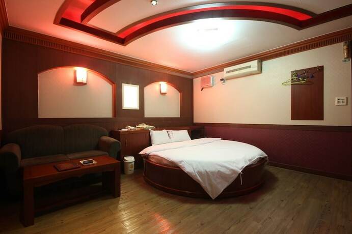Imagen de la habitación del Hotel Utopia Motel. Foto 18