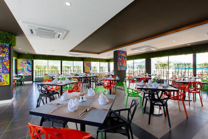 Imagen del bar/restaurante del Hotel Utopia Naiharn. Foto 9