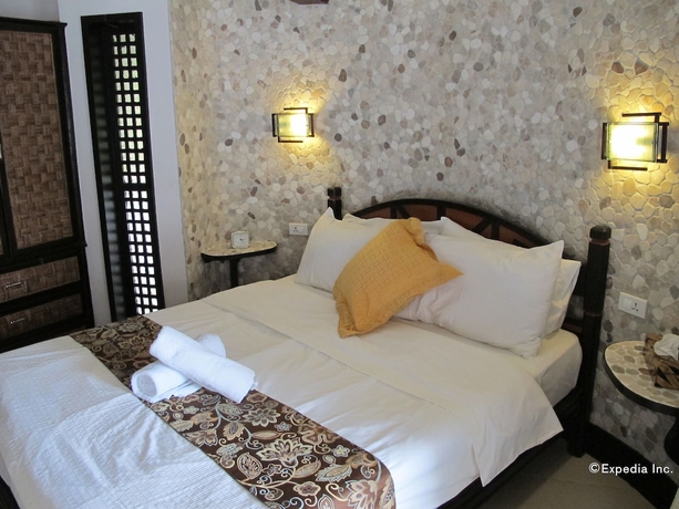 Imagen de la habitación del Hotel Utopia Resort And Spa. Foto 7