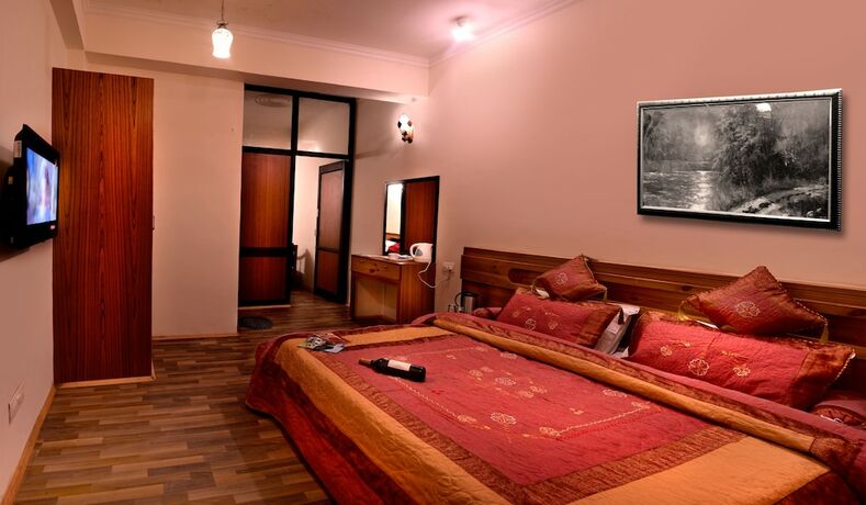 Imagen de la habitación del Hotel Utopia Resorts and Spa. Foto 16