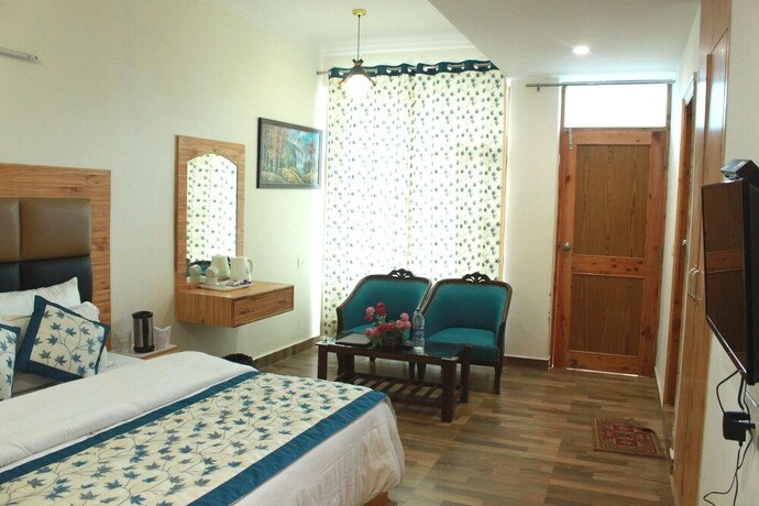 Imagen de la habitación del Hotel Utopia Resorts and Spa. Foto 18