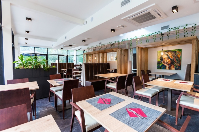 Imagen del bar/restaurante del Hotel Utopia, Soignies. Foto 3