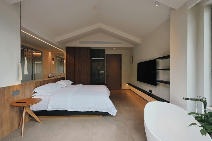 Imagen de la habitación del Hotel Utopia Yueji Art Seaview Designer Meisu. Foto 2