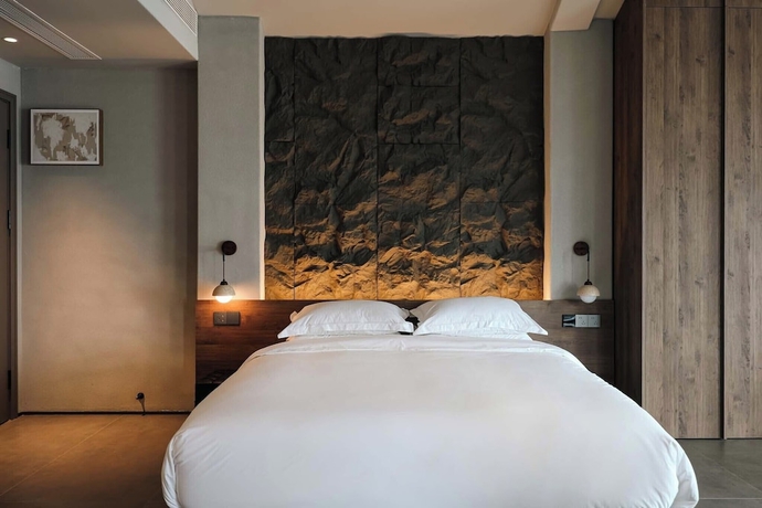 Imagen de la habitación del Hotel Utopia Yueji Art Seaview Designer Meisu. Foto 4