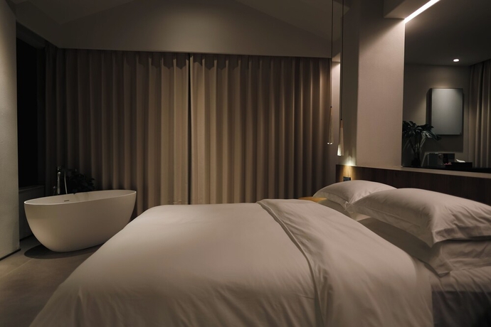 Imagen de la habitación del Hotel Utopia Yueji Art Seaview Designer Meisu. Foto 16
