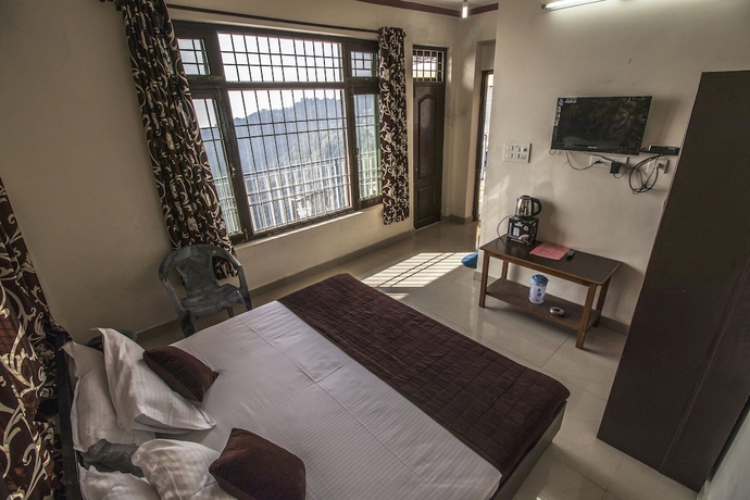 Imagen de la habitación del Hotel Utsang Guest House. Foto 11