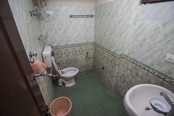 Imagen de la habitación del Hotel Utsang Guest House. Foto 15