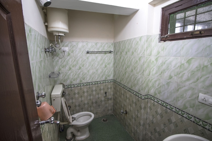 Imagen de la habitación del Hotel Utsang Guest House. Foto 16